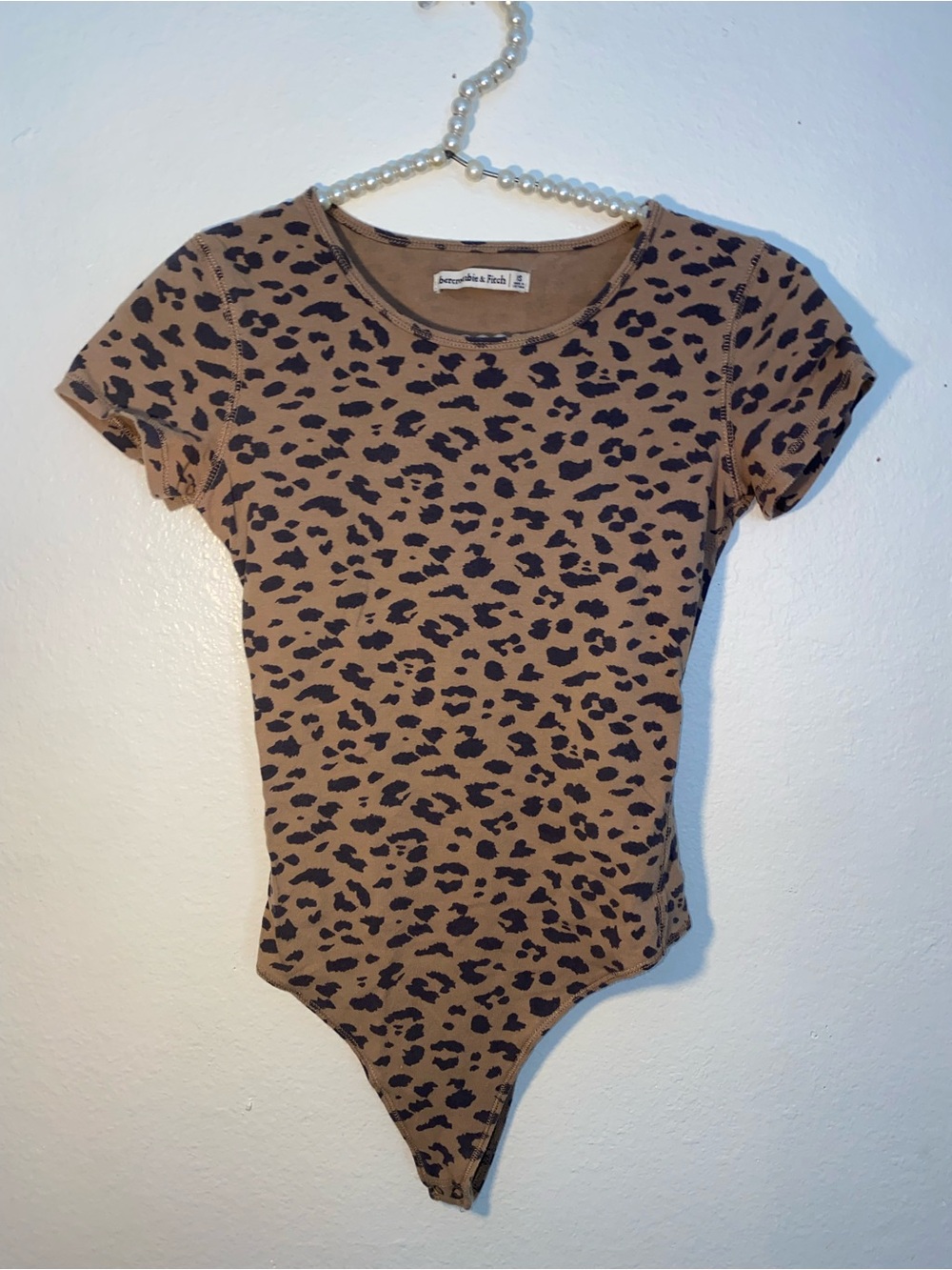 Abercrombie and fitch women’s size XS brown cheetah print bodysuit